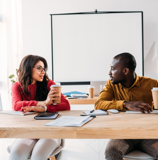 two-employees-collaborating-aura